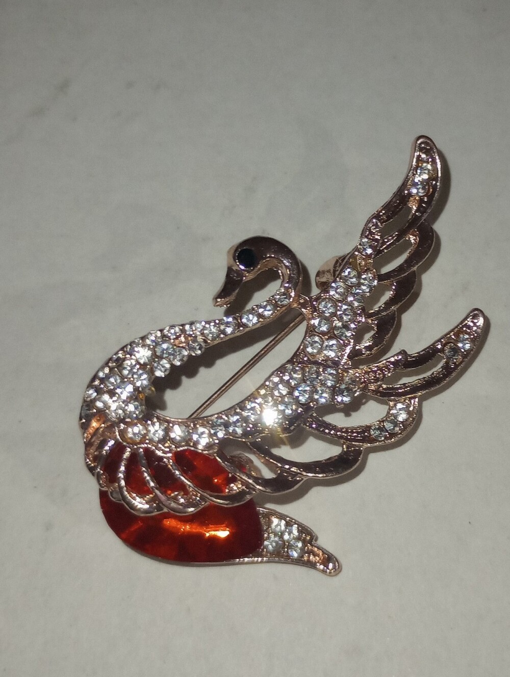 Elegant Swan Crystal Brooch Gold Tone with Red Accent